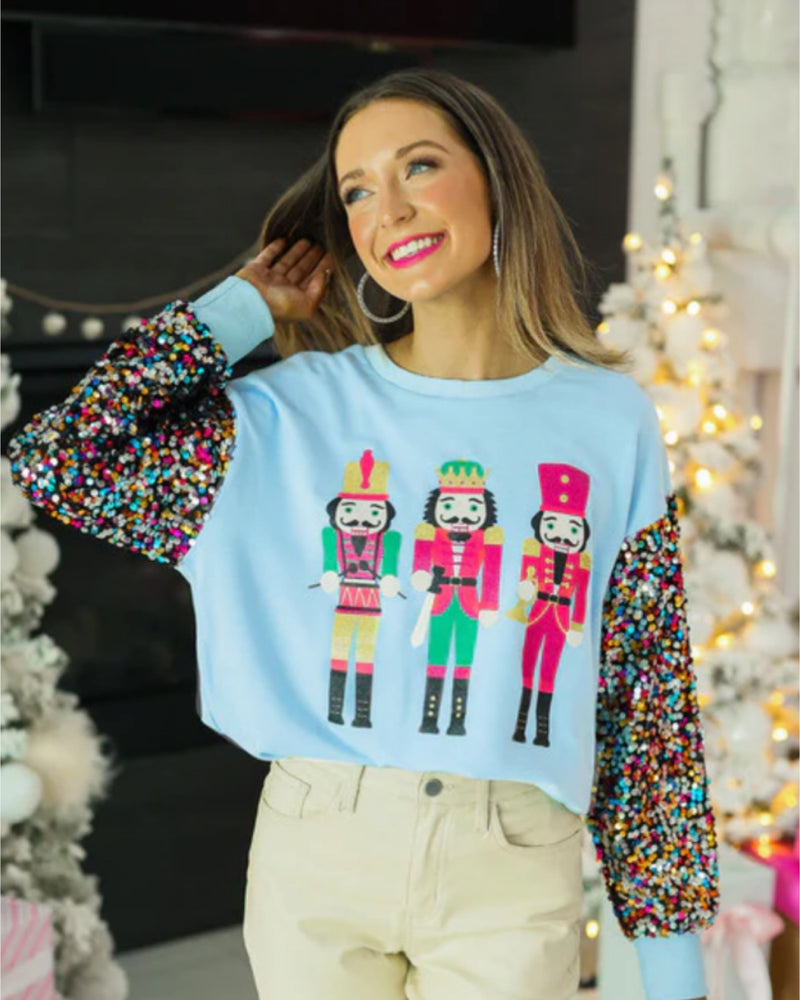 Nutcracker on Blue Sweatshirt with Sequin Sleeves