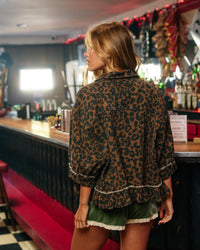 Ruffled Leopard Hemline Top