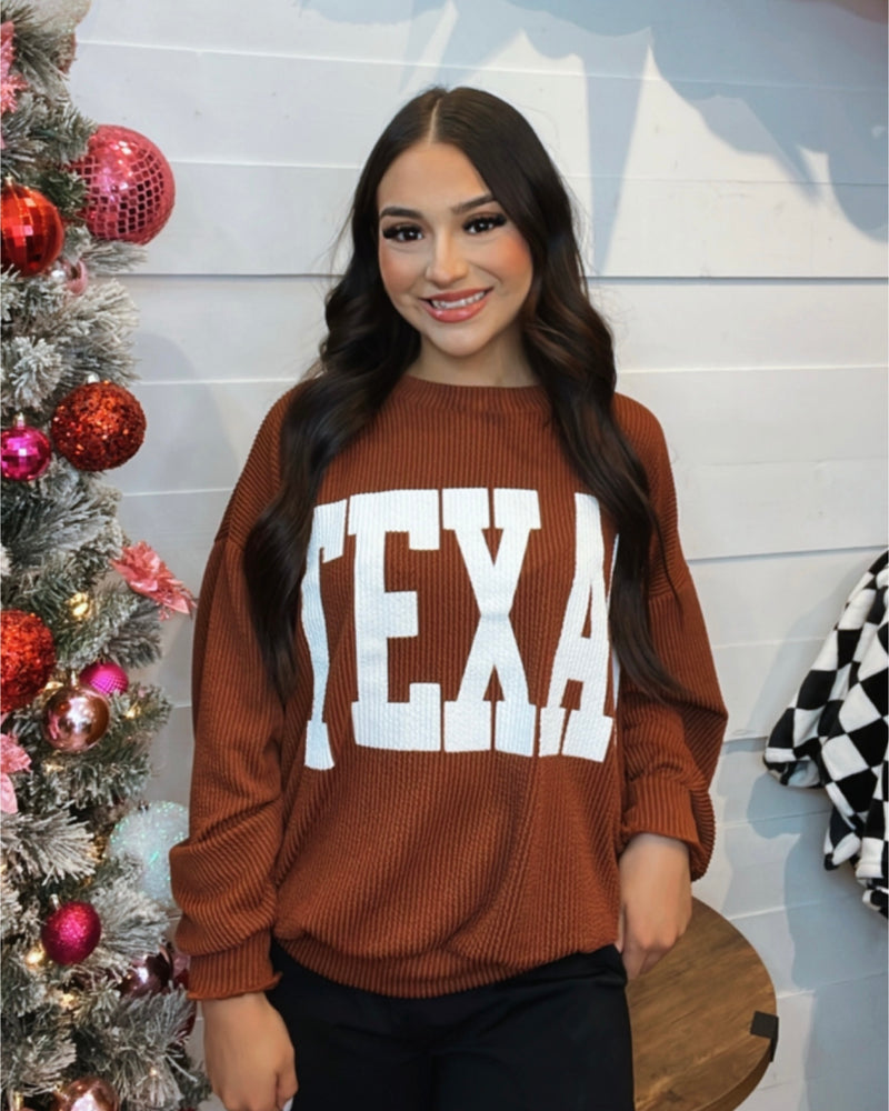 She’s like TEXAS sweatshirt in Brown